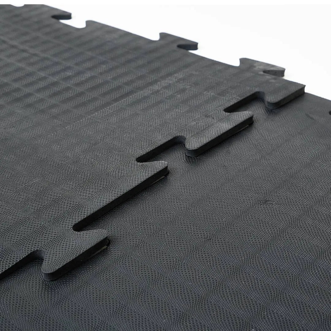 Loseta modular de hule tipo rompecabezas de 50x50 cm para piso de gimnasio — Hules Quimor JR